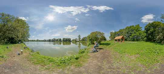Gmina Kurów – panorama na staw w Olesinie z wiatą wypoczynkową